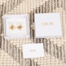 Серьги Dior c жемчужным бантом и CD-подвеской