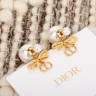 Серьги Dior c жемчужным бантом и CD-подвеской