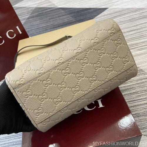 Маленькая сумка с ручкой GG Emblem