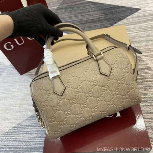 Маленькая сумка с ручкой GG Emblem